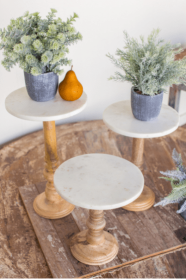 Set Of Three Wooden Display Stands With White Marble Tops